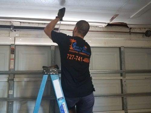 Garage door replacement in Clearwater spring fix